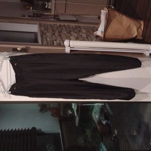 A pair of Notations black dress pants size 14 black